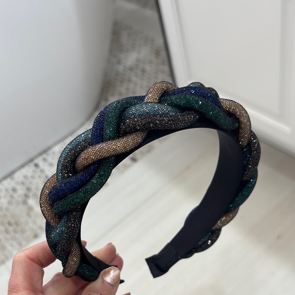 Braided Black and Green Hair Accessory with Plush Texture